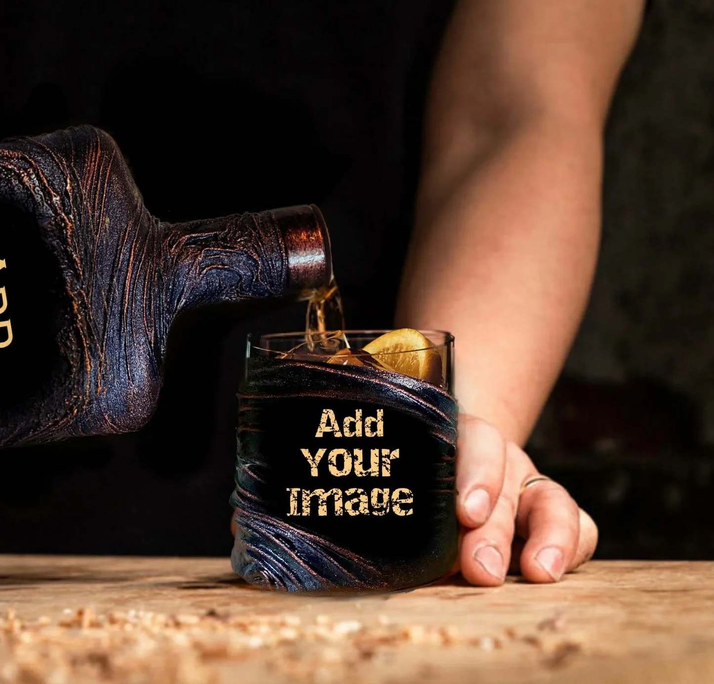 Person pouring a drink into a glass with 'Add Your Image' text, held by a hand on a wooden surface.